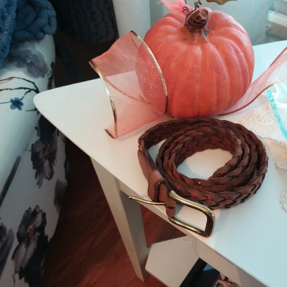 Women's Brown leather belt size medium . Length is 42 inches.